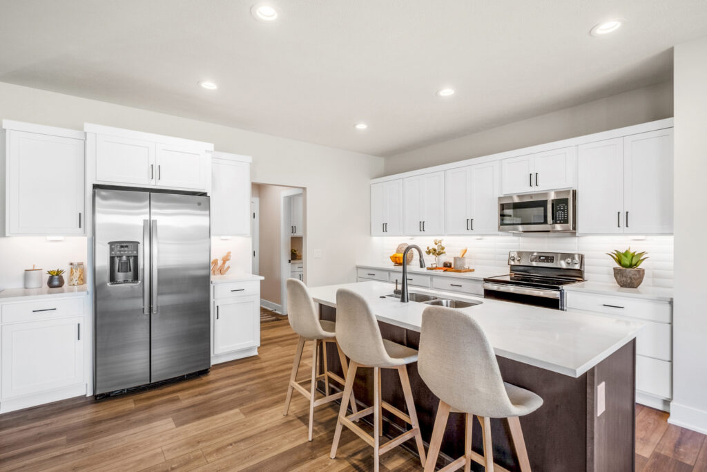 Brightly lit, white kitchen